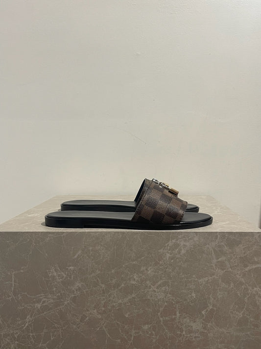 Mules Louis Vuitton Lock it T.40 NEUVES