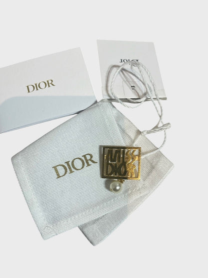 Broche Dior Miss Dior dorée