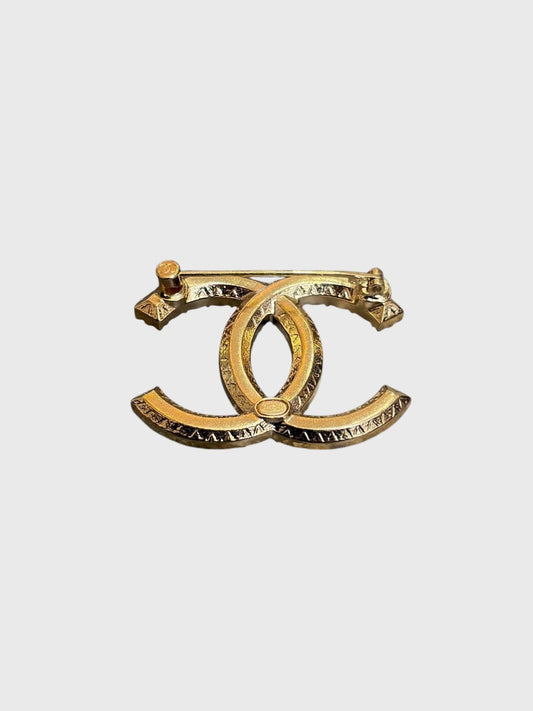 Broche Chanel CC dorée