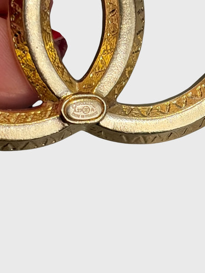 Broche Chanel CC dorée