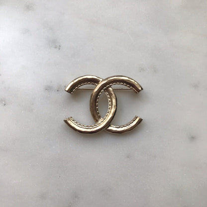 Broche Chanel CC dorée NEUVE