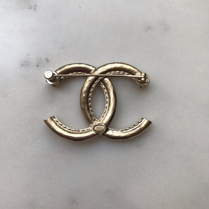 Broche Chanel CC dorée NEUVE