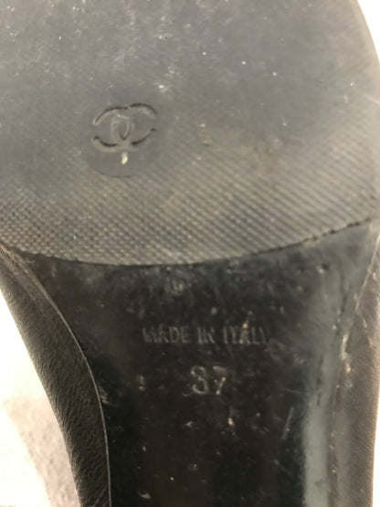 Boots Chanel noires T.37